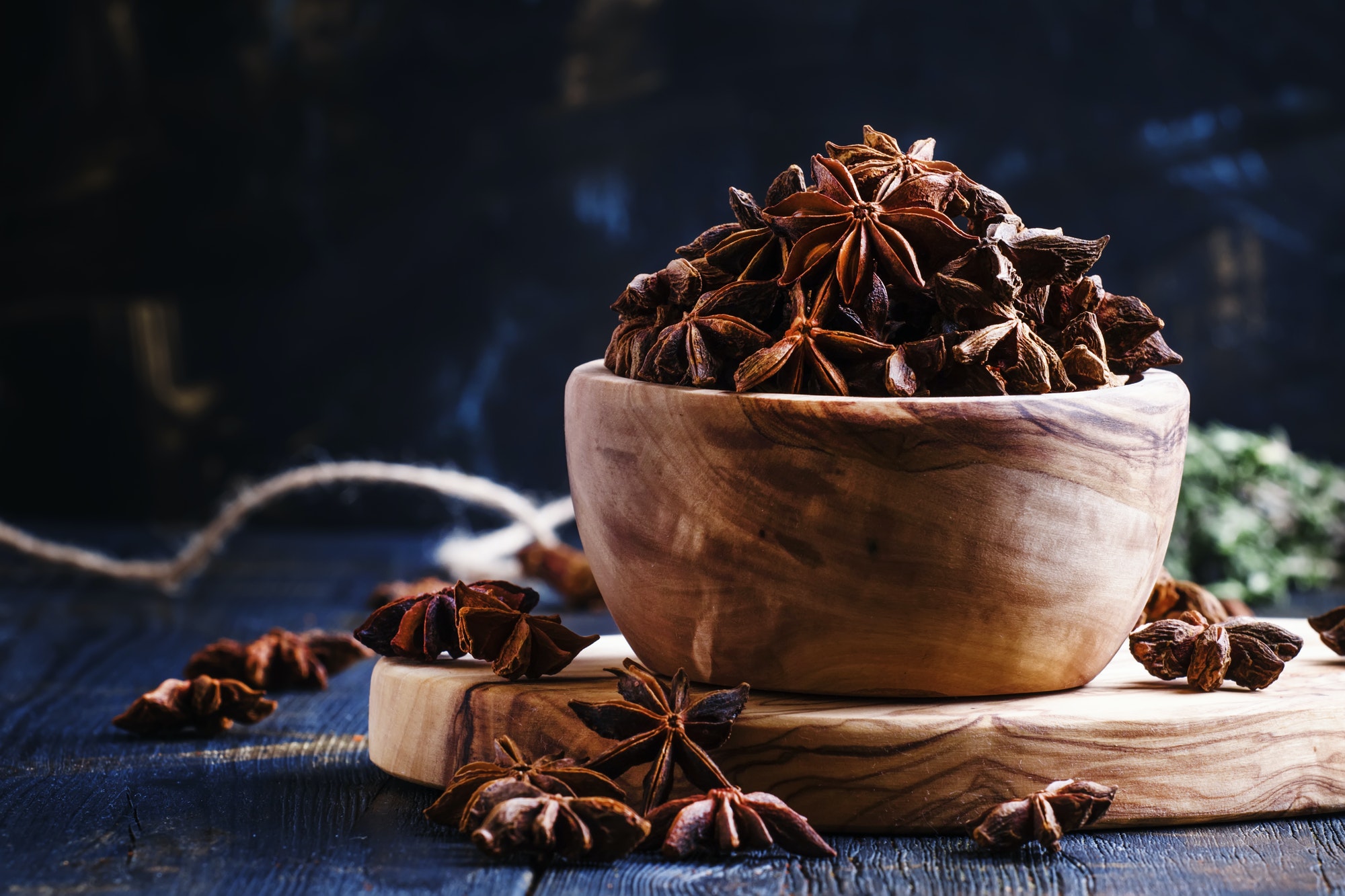 Anise stars in a wooden bowl