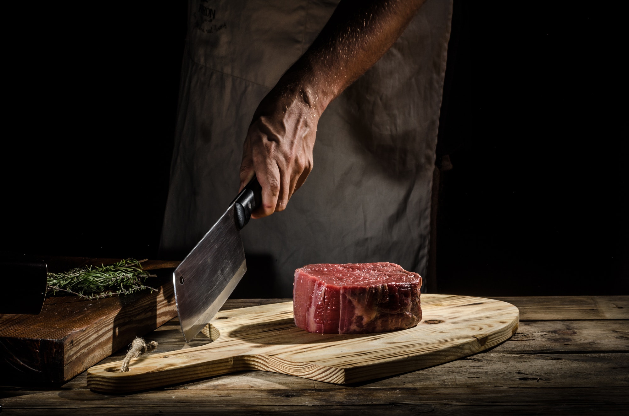 Chef butcher prepare beef steak